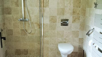 Shower, hair dryer, towels, soap