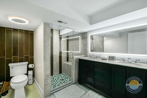 Shower, hair dryer, towels, shampoo