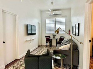 TV, offices - Casa Azola I | Perfectly located Boutique Apt. (San Juan)