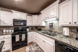 Fridge, microwave, oven, stovetop - Adobe Abode Duplex B - 4BR/3BA - South Lubbock (Lubbock)