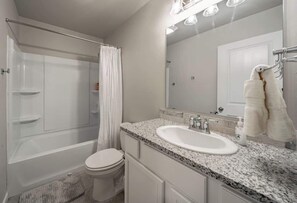 Shower, hair dryer, soap, shampoo