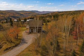 Exterior - Spa and River View | Le Haut-Perche (Petite-Rivière-Saint-François)