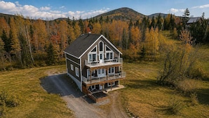 Exterior - Spa and River View | Le Haut-Perche (Petite-Rivière-Saint-François)