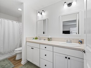 Shower, hair dryer, towels