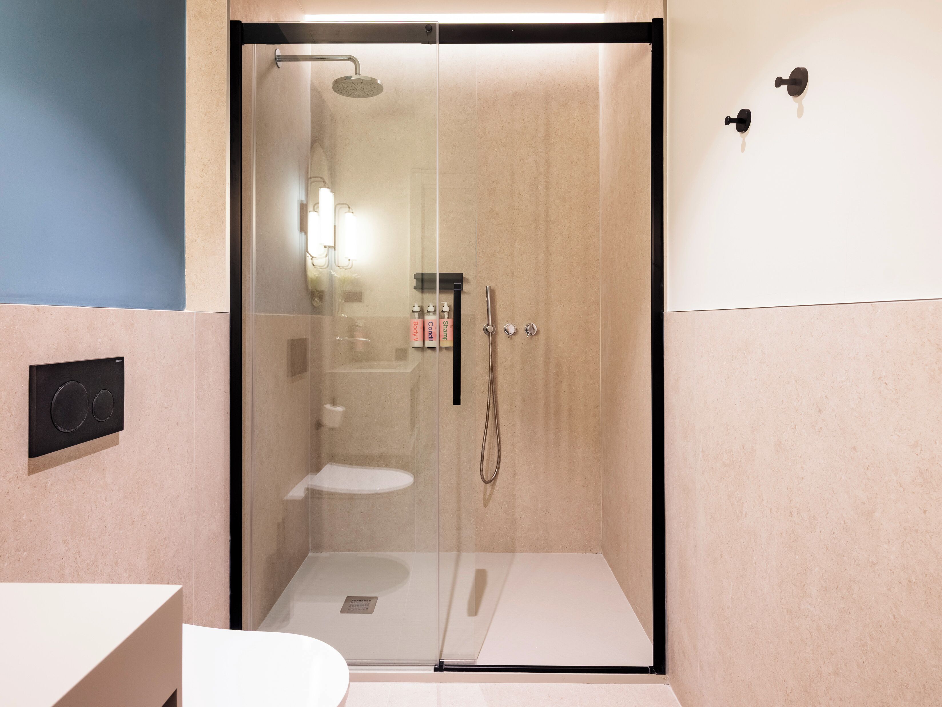 Large Room with Living Area | Bathroom | Shower, designer toiletries, hair dryer, towels