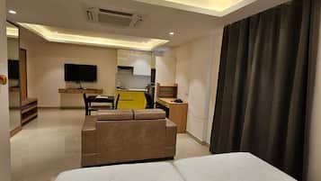 Desk, laptop workspace, blackout curtains, soundproofing