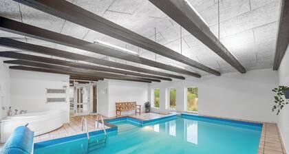 Large pool house with activity room located in peaceful surroundings.