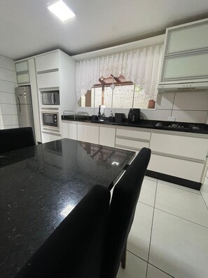 Premium House | Private kitchen | Fridge, microwave, oven, cookware/dishes/utensils