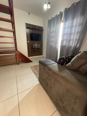 Premium House | Living area | 42-inch Smart TV with digital channels, Netflix, pay movies