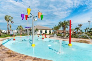 A water park with multiple water features and a pool area. - Amazing 5Bdrms At Storey Lake (Kissimmee)