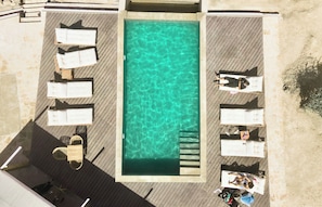 Outdoor pool, pool umbrellas, pool loungers