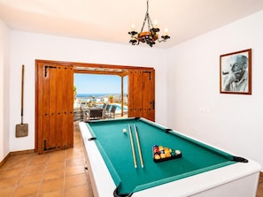 A pool table with balls, a pool cue, and a billiards rack. - Villa Valiente - Four Bedroom Villa, Sleeps 8 (Tías)