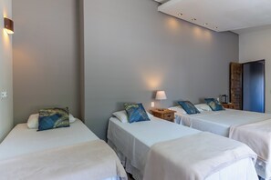 Family Quadruple Room, Pool View | Laptop workspace, iron/ironing board, free WiFi, bed sheets