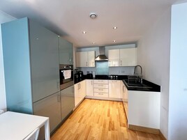 Apartment | Private kitchen | Fridge, microwave, oven, stovetop