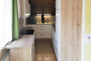 Appartement Classique, 3 chambres | Cuisine privée | Réfrigérateur, micro-ondes, four