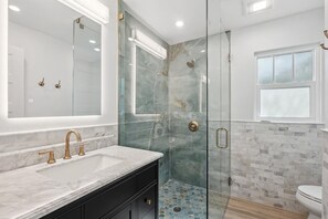 Shower, hair dryer, towels, soap