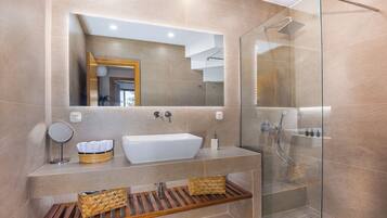 Shower, free toiletries, hair dryer, slippers