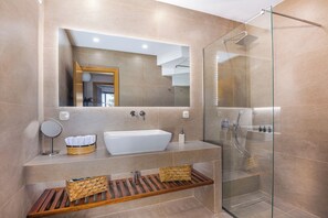 Shower, free toiletries, hair dryer, slippers