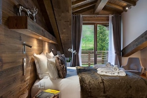 4 bedrooms, WiFi, bed sheets - Wifi, resort center, 3rd floor, sauna, hammam, balcony, fireplace or stove, parking, tv, 158m² (Les Gets)