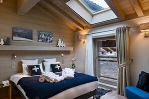 4 bedrooms, WiFi, bed sheets - Wifi, resort center, 3rd floor, view mountain, sauna, hammam, terrace, balcony, fireplace or stove (Les Gets)