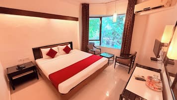 Deluxe Room, City View | Individually furnished, desk, laptop workspace, free WiFi