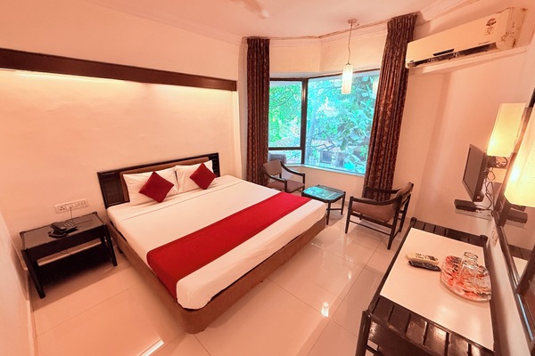 Deluxe Room, City View | Individually furnished, desk, laptop workspace, free WiFi