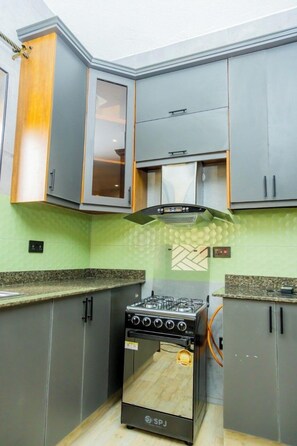 Economy Apartment, City View | Private kitchen - Cozy Residences Kampala 007 (Kampala)
