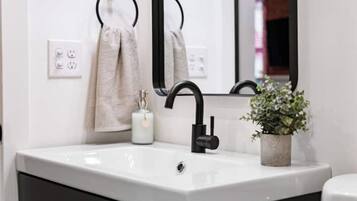 Hair dryer, towels, soap, shampoo