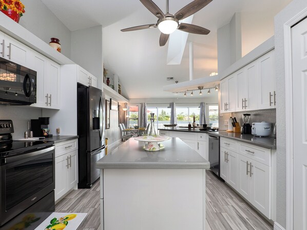 Private kitchen - Stunning Lakefront Solar Heated Pool & Spa House! Close to the Beach! (Bonita Springs)