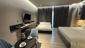 Family Room, 1 Bedroom | 1 bedroom, Egyptian cotton sheets, premium bedding, minibar