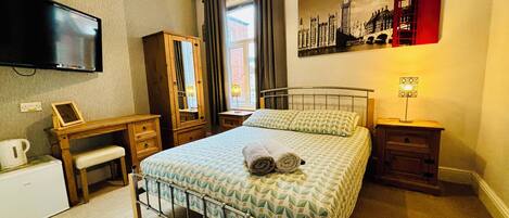 Cortinas blackout, tabla de planchar con plancha y wifi gratis