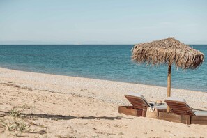 A la platja, gandules de platja i tovalloles de platja 