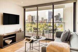 Honeymoon Apartment | Living area | 43-inch Smart TV with digital channels, Netflix, streaming services