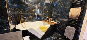 Shower, hair dryer, towels