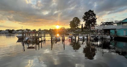Charming 2 bedroom condo with waterfront/dock access! Community pool!