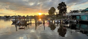 Charming 2 bedroom condo with waterfront/dock access! Community pool!