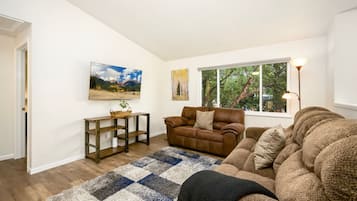 House, Multiple Beds, Balcony, Garden View (1119 S Edinburgh Drive) | Living area | 50-inch flat-screen TV with digital channels