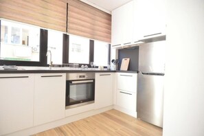 Private kitchen - Tirana Central Apartments - Studio Apartment (Tirana)