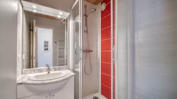 Regadera y secadora de cabello