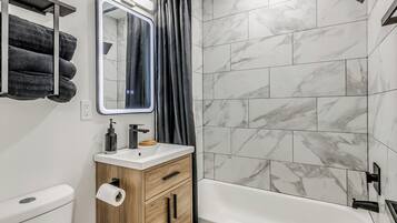 Hair dryer, towels, soap, toilet paper