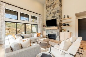 Smart TV, fireplace, table football, books