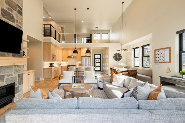 Smart TV, fireplace, foosball, books