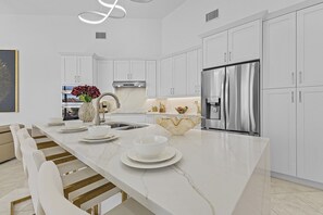 Fridge, microwave, oven, stovetop - Experience Luxury- Gulf Access, Stunning Canal Views, Heated Pool- Villa Avalon - Roelens (Cape Coral)