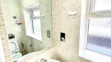 Hair dryer, towels, soap, toilet paper