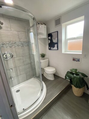 Shower, towels, soap, shampoo - Unique container home  (El Cajon)