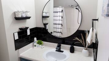 Hair dryer, towels, soap, shampoo
