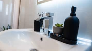 Hair dryer, towels, shampoo