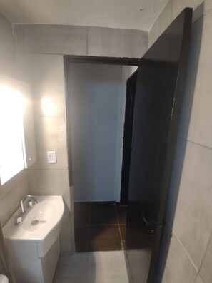 Bidet, towels, toilet paper