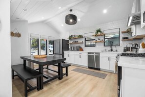 Coffee/tea maker, fridge, microwave, oven