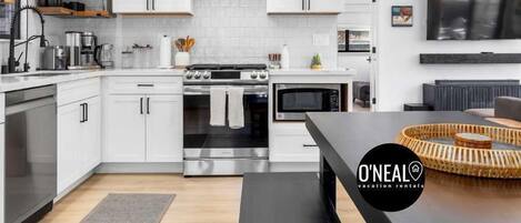Coffee/tea maker, fridge, microwave, oven